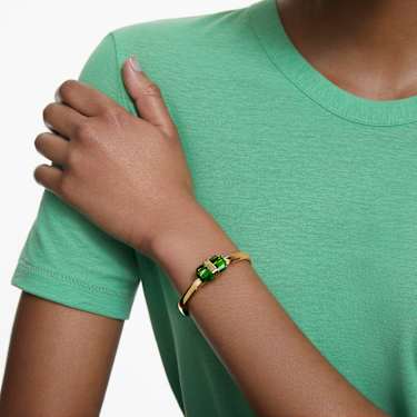 Lucent bangle, Magnetic closure, Green, Gold-tone finish | Swarovski Lucent bangle, Magnetic closure, Green, Gold-tone finish | Swarovski