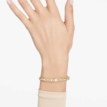 Bracciale rigido Numina, Tagli arrotondati misti, Bianco, Placcato color oro - Swarovski, 5681452