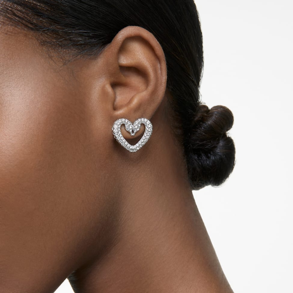 Una stud earrings, Heart, Medium, White, Rhodium plated by SWAROVSKI