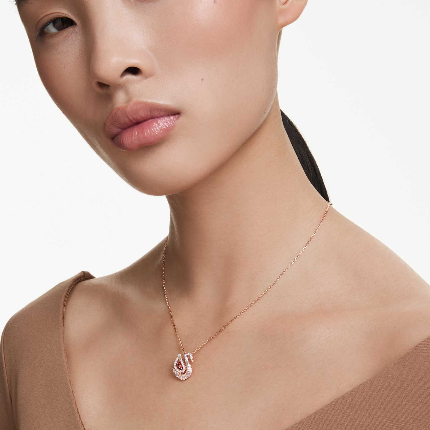 Swan pendant, Dancing swan, Red, Rose gold-tone plated | Swarovski