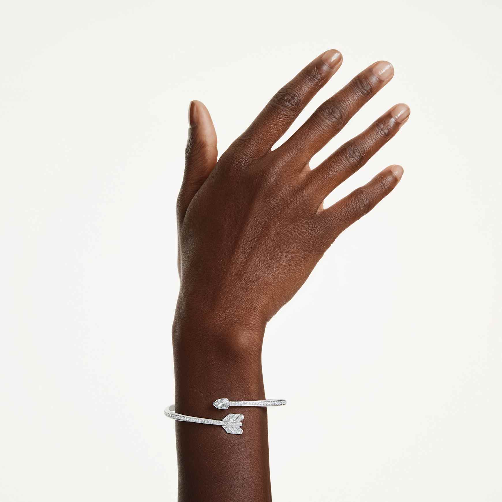 Idyllia bangle, Mixed cuts, Arrow, White, Rhodium plated by SWAROVSKI