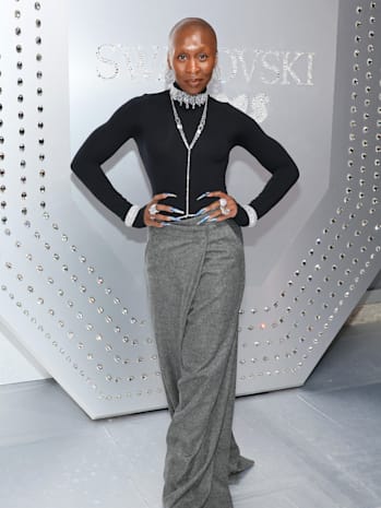 Kim Kardashian Shines In A Sheer Crystal Top And Miniskirt For Skims X  Swarovski Red Carpet Event