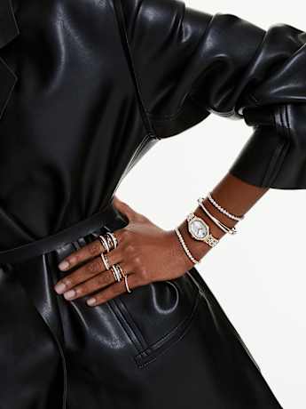 Combinación de pulseras y reloj al estilo Swarovski