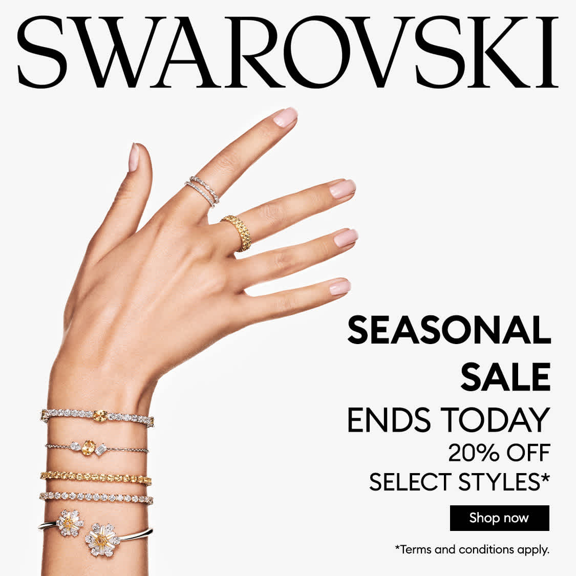 Model wearing stacked bracelets