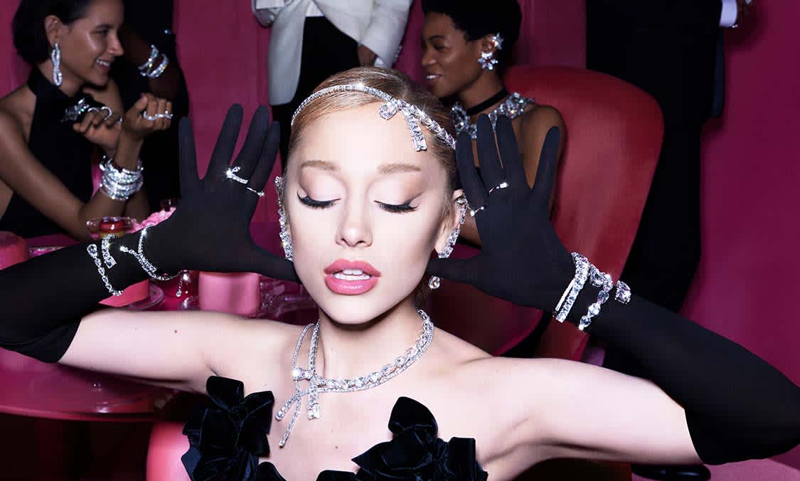 Ariana Grande wearing stacked Swarovski bracelets
