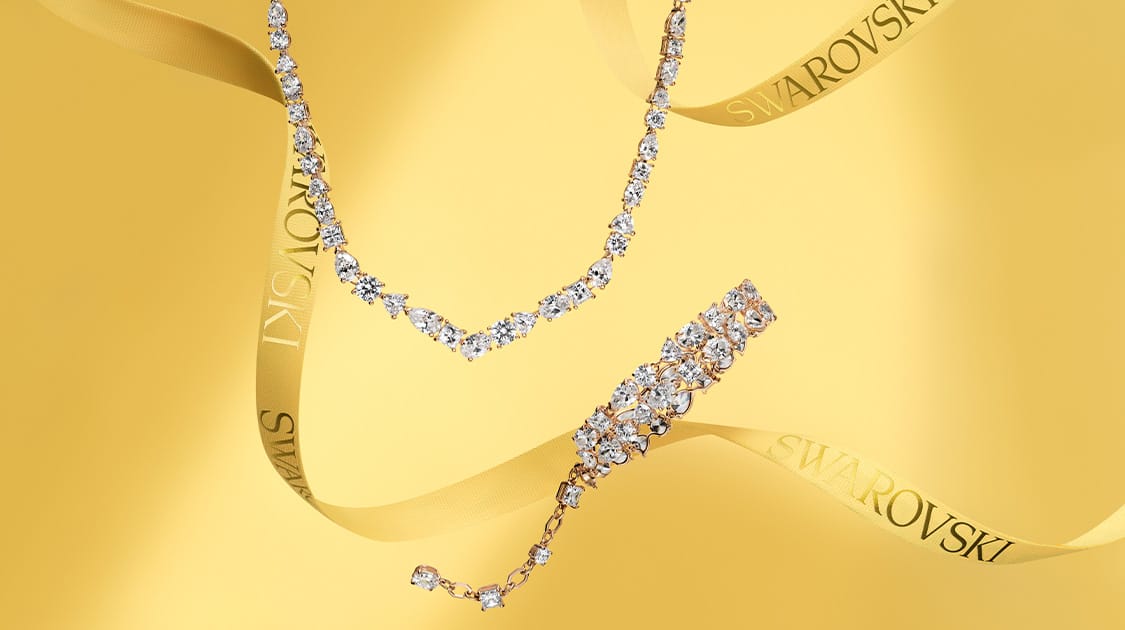 Swarovski Mesmera necklace on yellow background