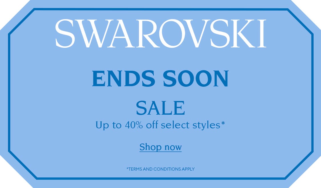 Blue sign with text reading 'SWAROVSKI ENDS SOON SALE Up to 40% off select styles* Shop now *TERMS AND CONDITIONS APPLY'