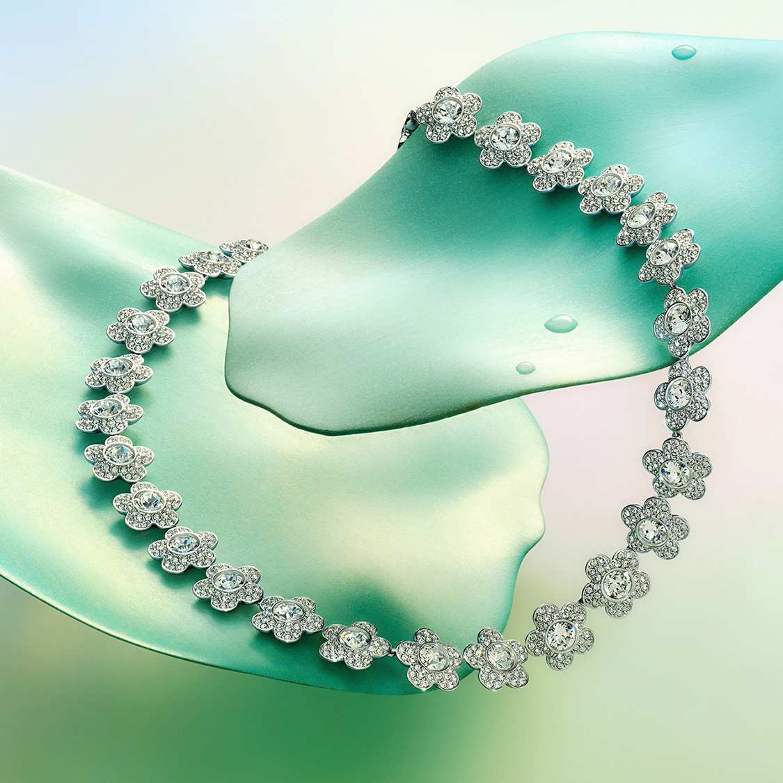 Ariana Grande x Swarovski necklace on petals
