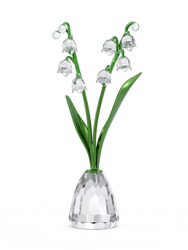 Konvalinka z Křišťálu Swarovski je vložena do malé fasetované čiré vázy.