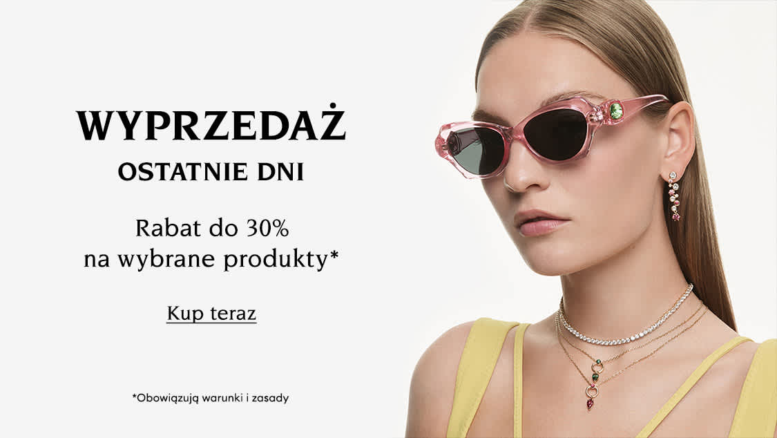 Modelka w biżuterii Swarovski. Napis brzmi: „WYPRZEDAŻ OSTATNIE DNI Rabat do 30% na wybrane produkty* *Obowiązują warunki i zasady”. Napis na przycisku brzmi: „Kup teraz”