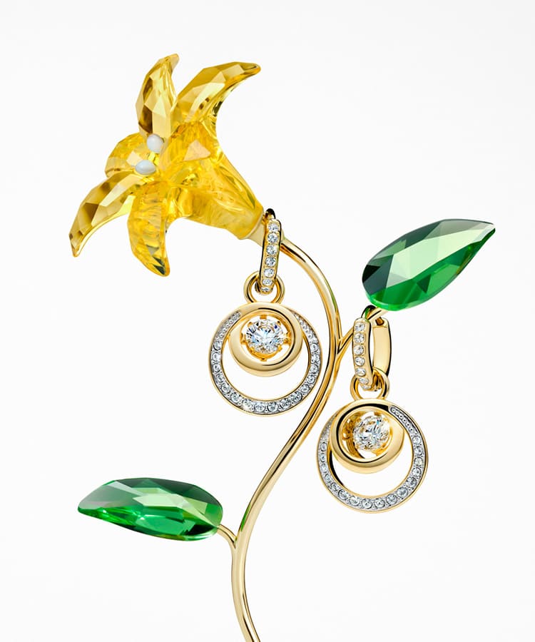 Swarovski Florere Lily with Swarovski earrings hanging on it