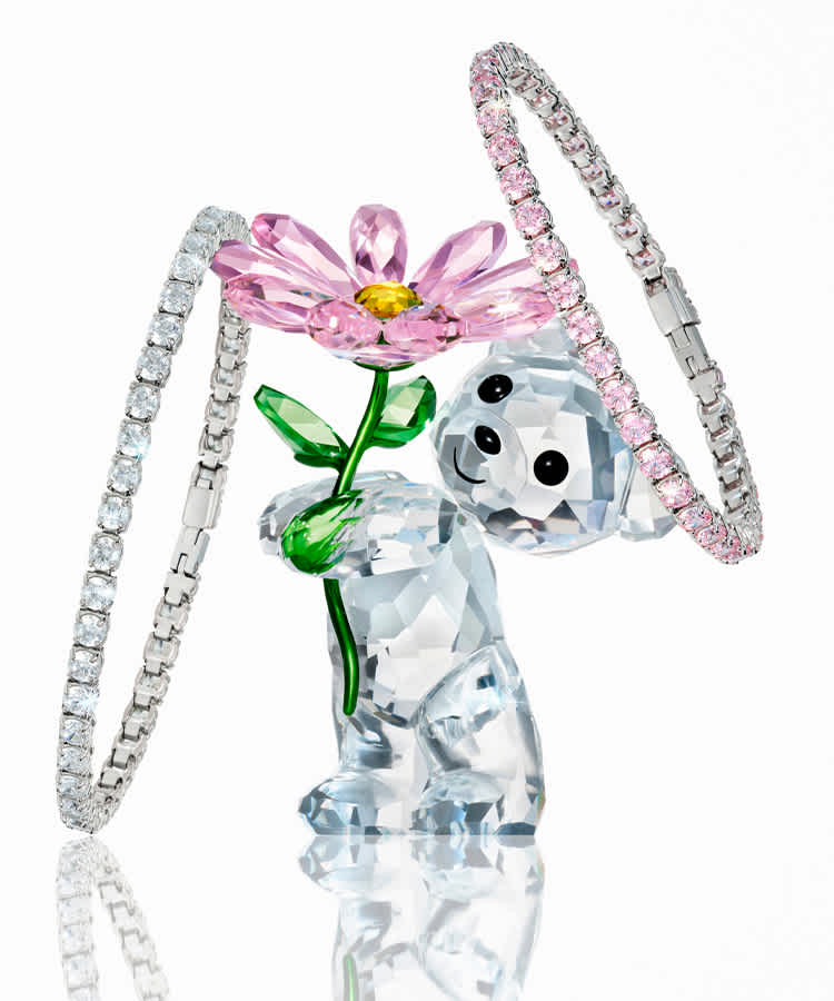 Swarovski Kris Bear A Daisy For You figurine and two Swarovski bracelets