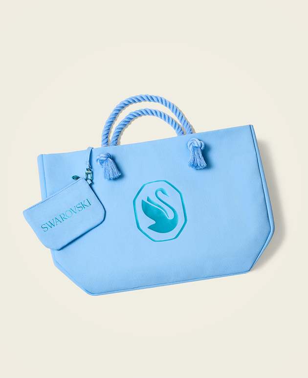 Blue Swarovski Tote bag on blue background