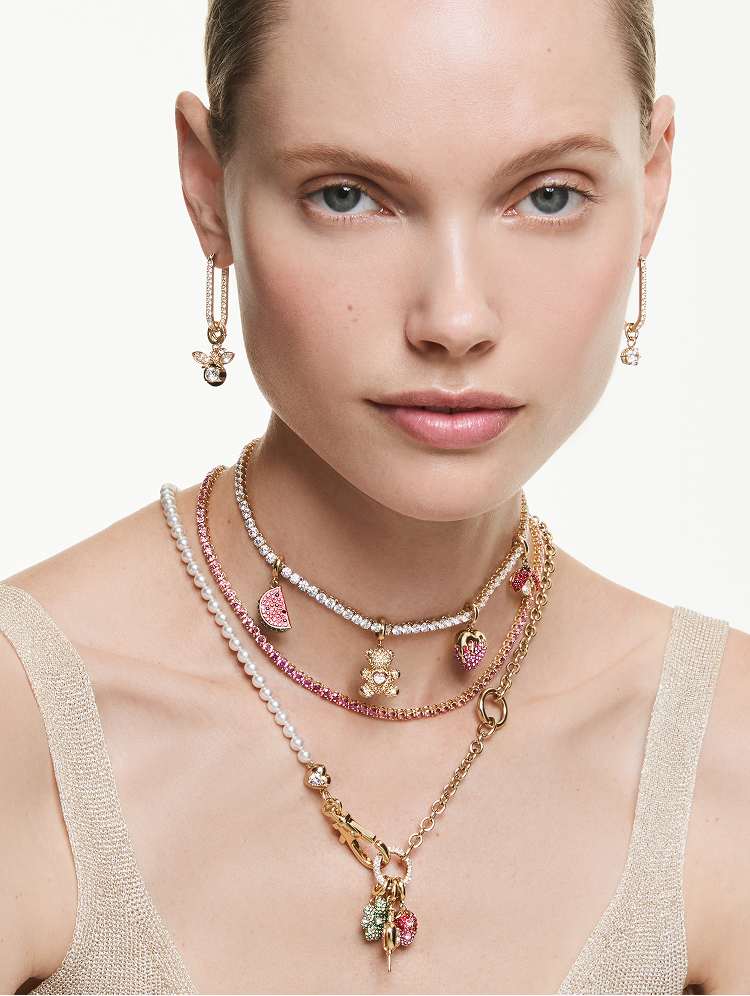 Model wearing Matrix Tennis necklace with charms